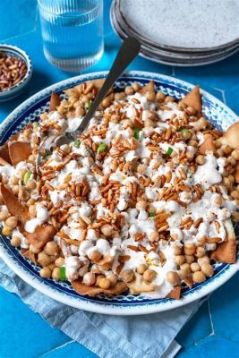  Fatteh: Un piatto egiziano irresistibile che combina sapori speziati e consistenze cremose!