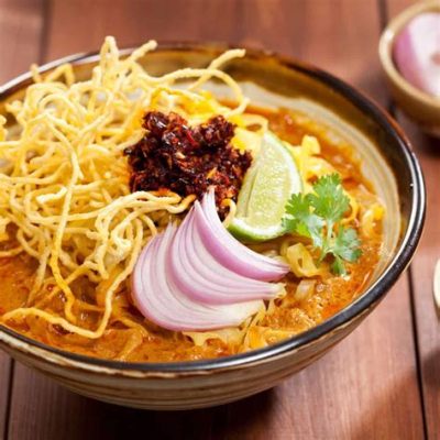  Khao Soi: Un Piatto Piccante e Cremoso che Ti Trasportare in un Mercato Thai